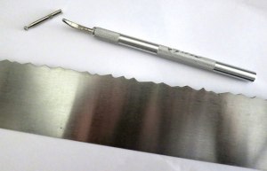 Deckle edge tool, burnisher and stylus point